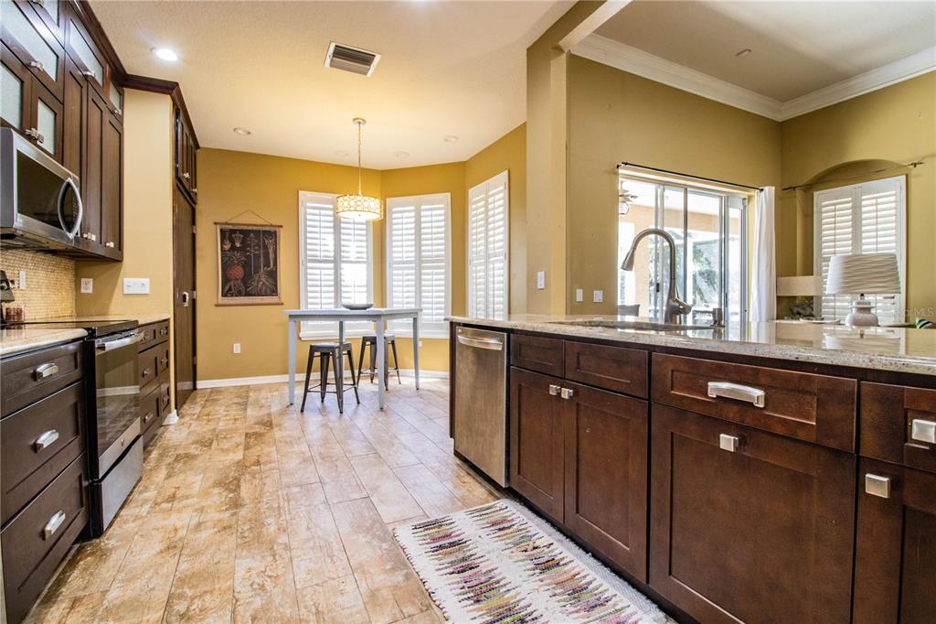 3234 Stonebridge Trail Valrico, FL 33596 - Photo 11 of 34 a large kitchen with lots of counter top space