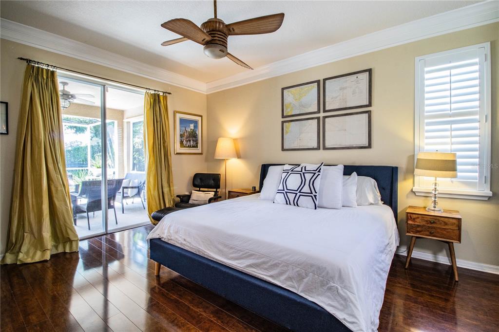 3234 Stonebridge Trail Valrico, FL 33596 - Photo 19 of 34 a bedroom with a bed and a table