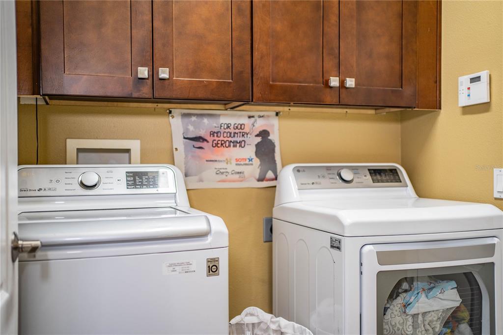 3234 Stonebridge Trail Valrico, FL 33596 - Photo 26 of 34 a utility room with dryer and washer