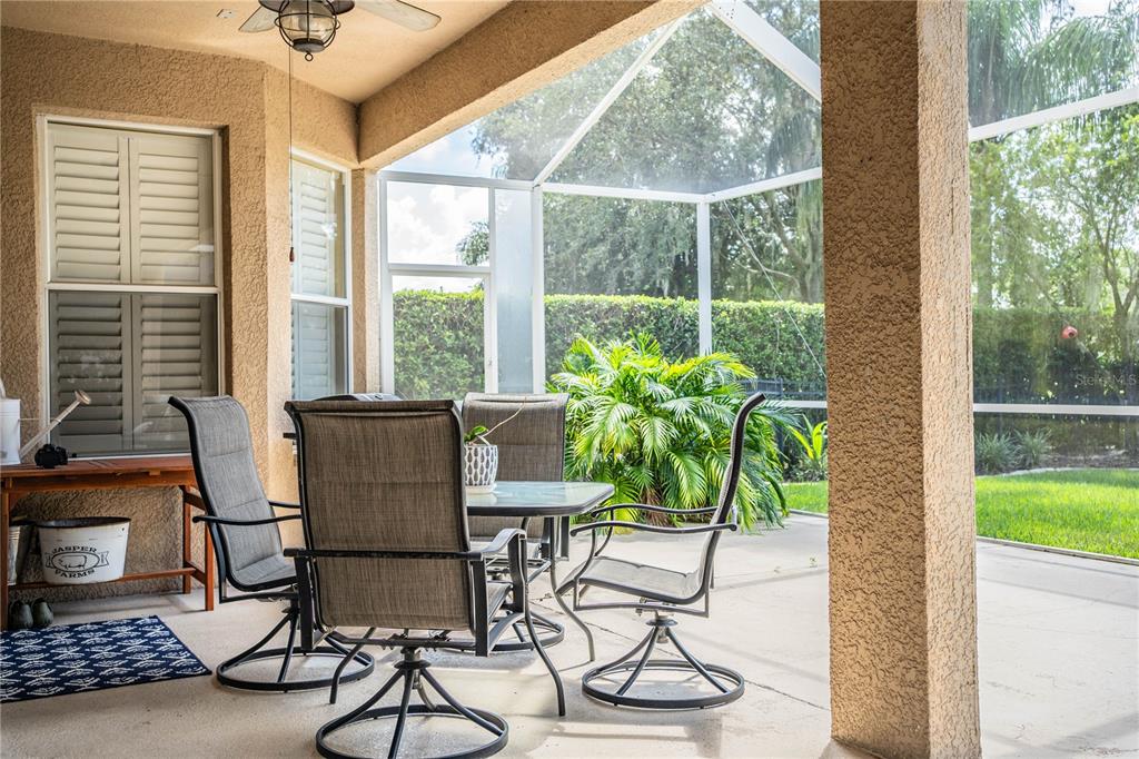 3234 Stonebridge Trail Valrico, FL 33596 - Photo 29 of 34 a dining room with furniture window and outside view