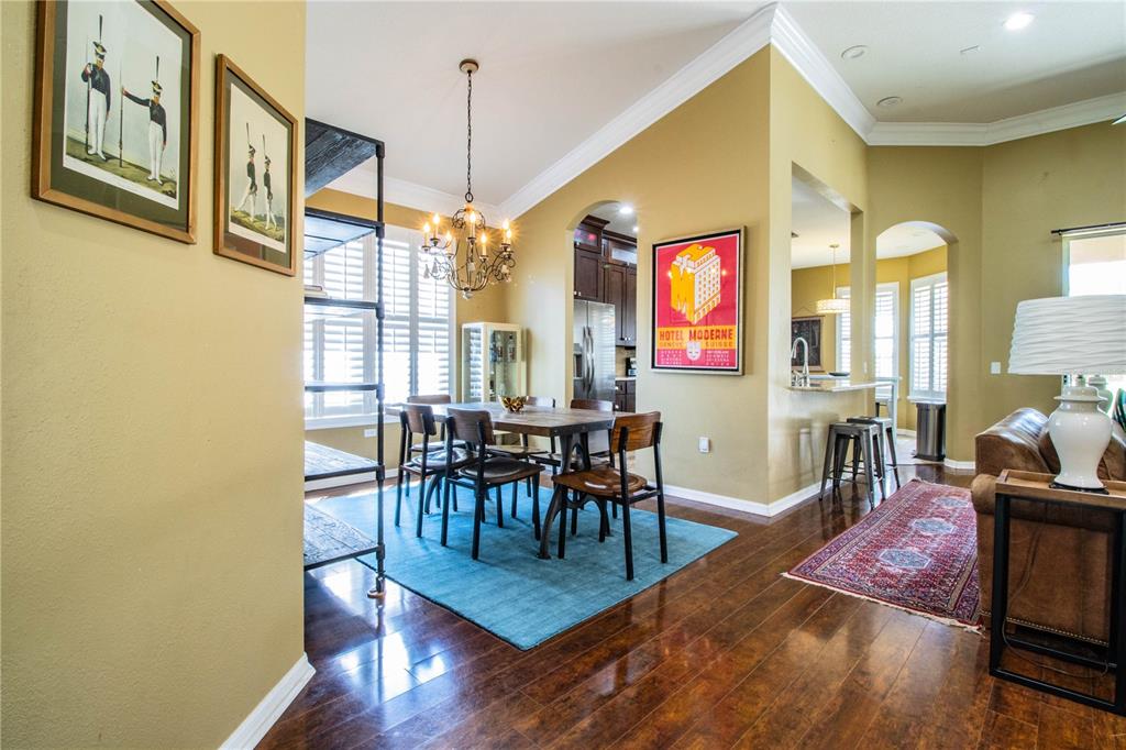 3234 Stonebridge Trail Valrico, FL 33596 - Photo 6 of 34 a view of a dining room with furniture and wooden floor