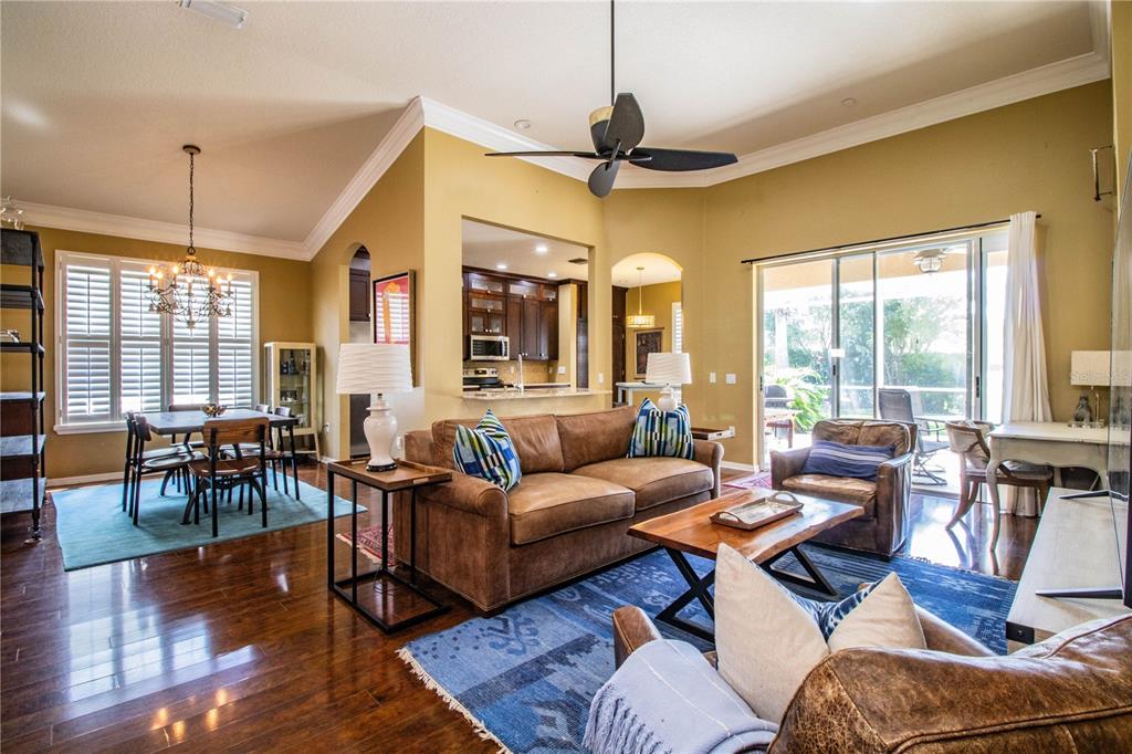3234 Stonebridge Trail Valrico, FL 33596 - Photo 8 of 34 a living room with furniture and a large window