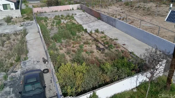 a view of a garden with an outdoor space