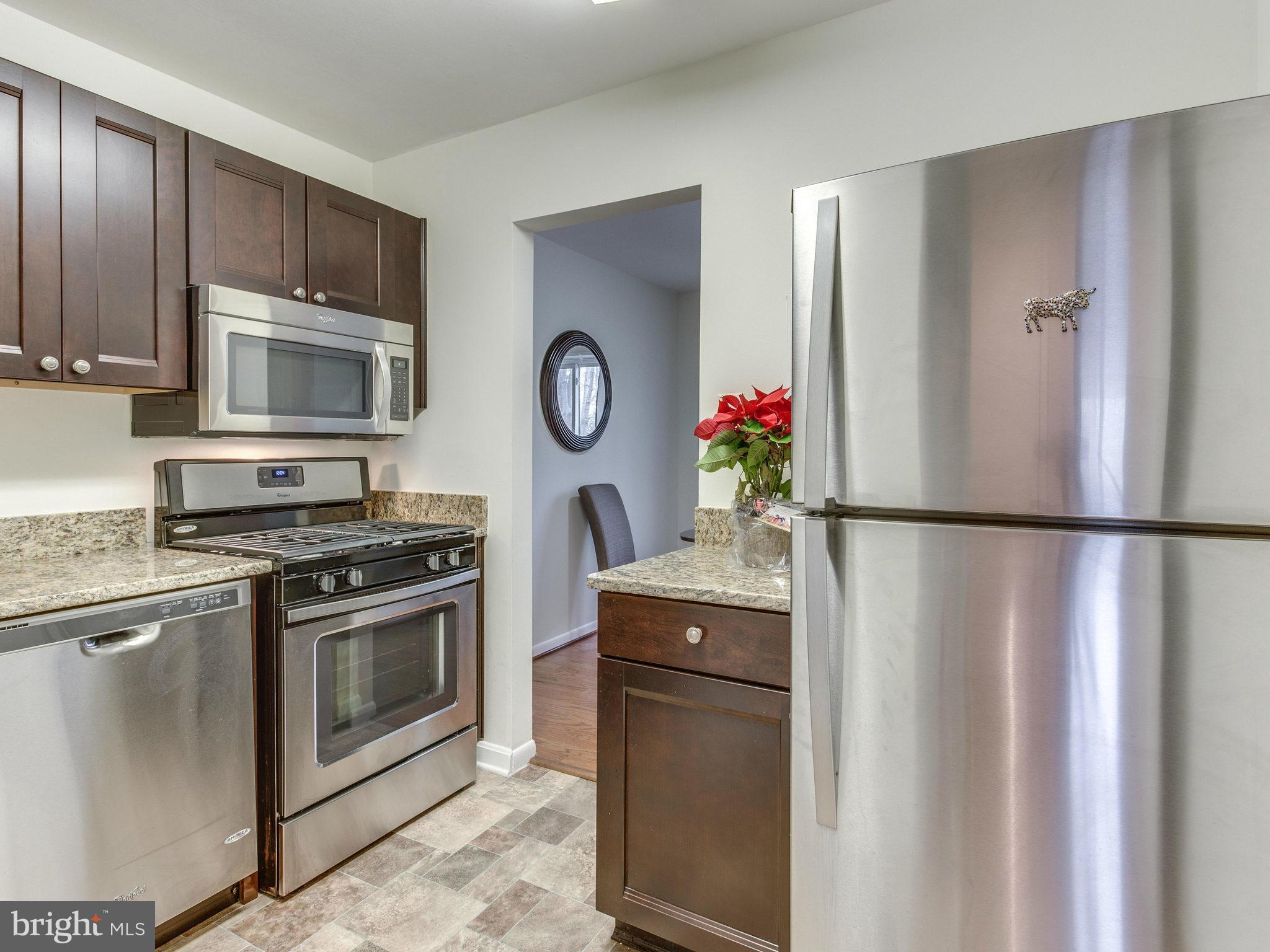 1538 Northgate Square, Unit 32A Reston, VA 20190 - Photo 9 of 23 New SS appliances and granite counter tops