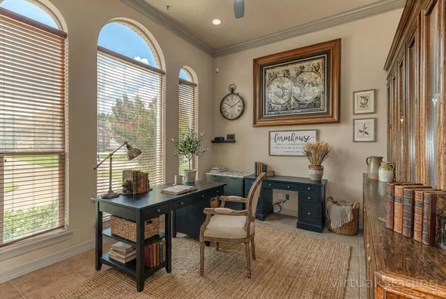 a view of a livingroom with furniture and a window