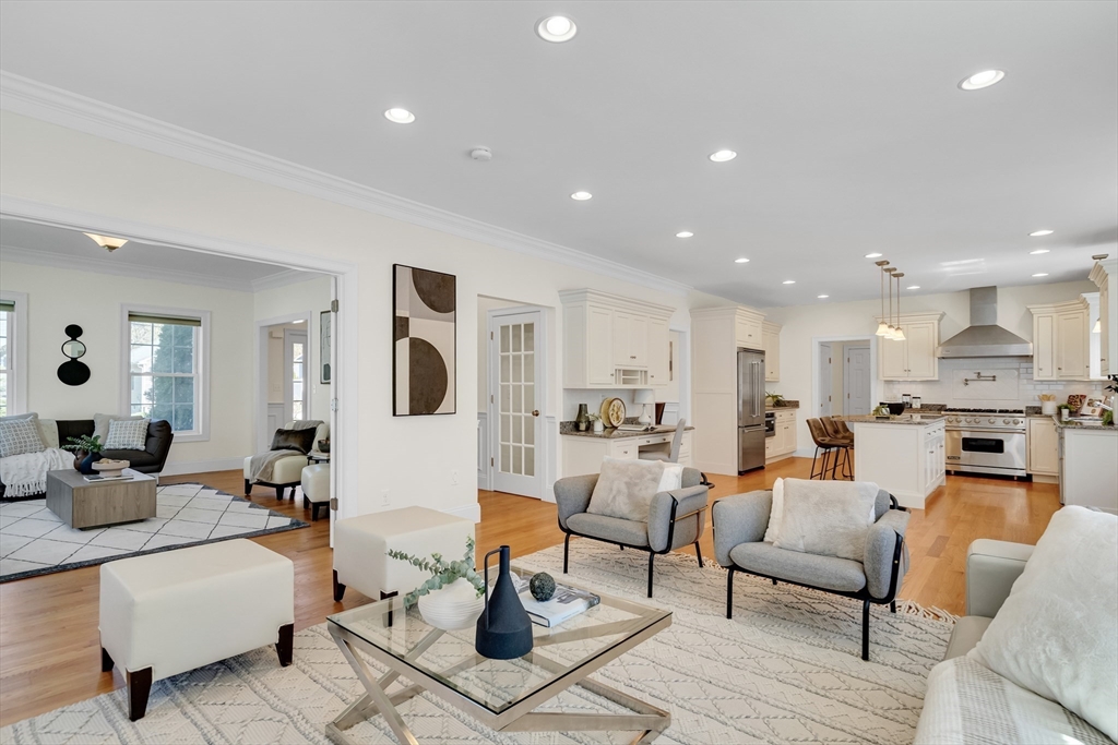 19 Bryn Mawr Road Wellesley, MA 02482 - Photo 13 of 42 a living room with fireplace furniture and a wooden floor