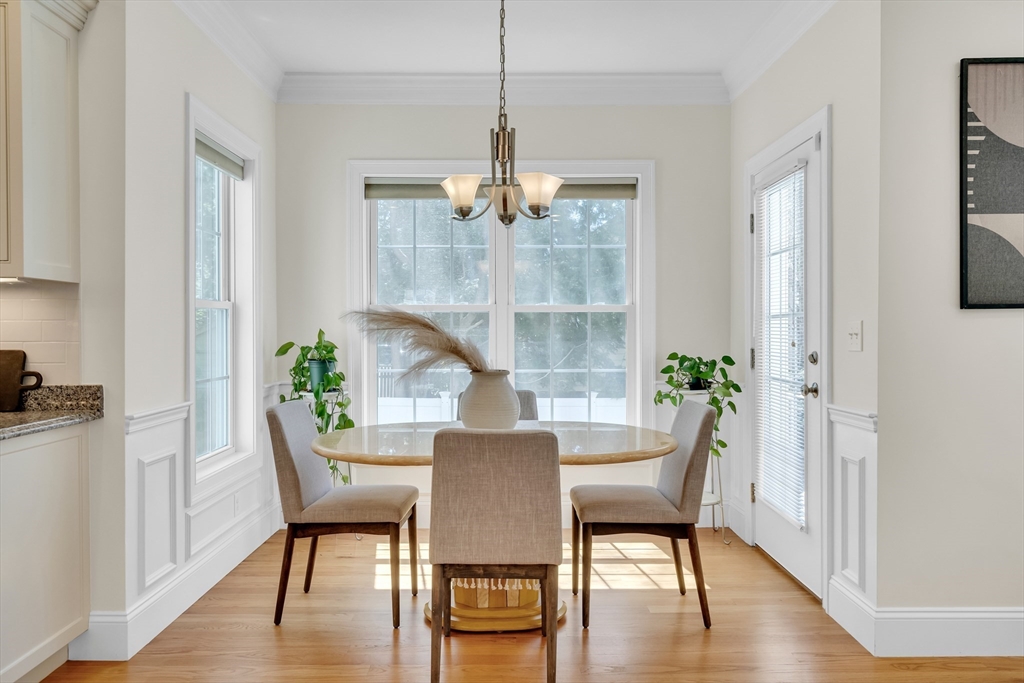19 Bryn Mawr Road Wellesley, MA 02482 - Photo 15 of 42 a view of a dining room with furniture window and wooden floor