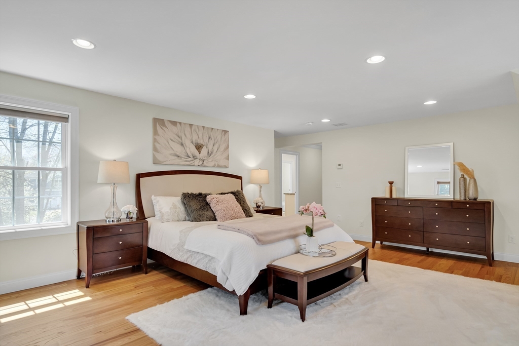 19 Bryn Mawr Road Wellesley, MA 02482 - Photo 23 of 42 a bedroom with a bed and window