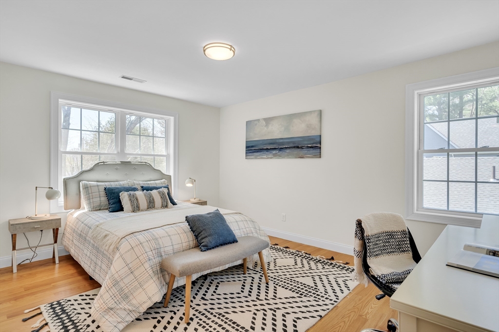 19 Bryn Mawr Road Wellesley, MA 02482 - Photo 28 of 42 a bedroom with a bed and a window