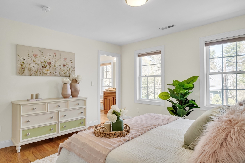 19 Bryn Mawr Road Wellesley, MA 02482 - Photo 34 of 42 a bedroom with a bed and a window