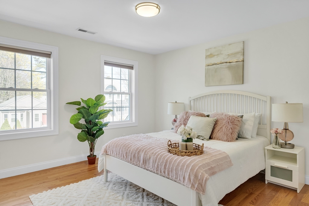 19 Bryn Mawr Road Wellesley, MA 02482 - Photo 36 of 42 a bedroom with a bed and a window