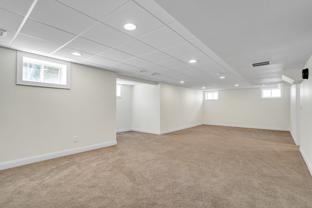 19 Bryn Mawr Road Wellesley, MA 02482 - Photo 39 of 42 an empty room with a empty space and window