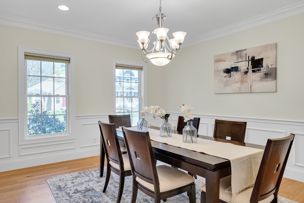 19 Bryn Mawr Road Wellesley, MA 02482 - Photo 4 of 42 a view of a dining room with a table and chairs