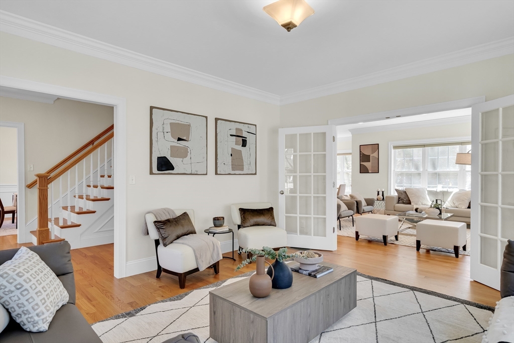 19 Bryn Mawr Road Wellesley, MA 02482 - Photo 9 of 42 a living room with furniture and wooden floor