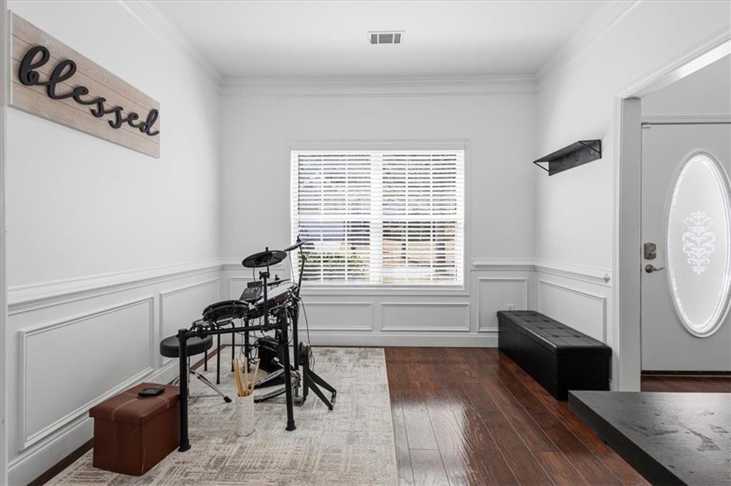 1380 Commonwealth Lane Grayson, GA 30017 - Photo 12 of 46 a view of a workspace with furniture and a window