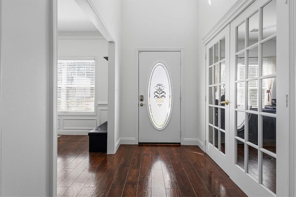 1380 Commonwealth Lane Grayson, GA 30017 - Photo 13 of 46 a view of a room with wooden floor and windows