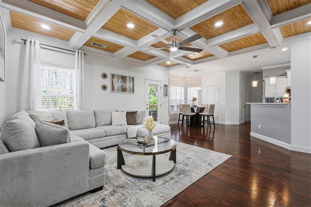 1380 Commonwealth Lane Grayson, GA 30017 - Photo 20 of 46 a living room with furniture wooden floor and a table