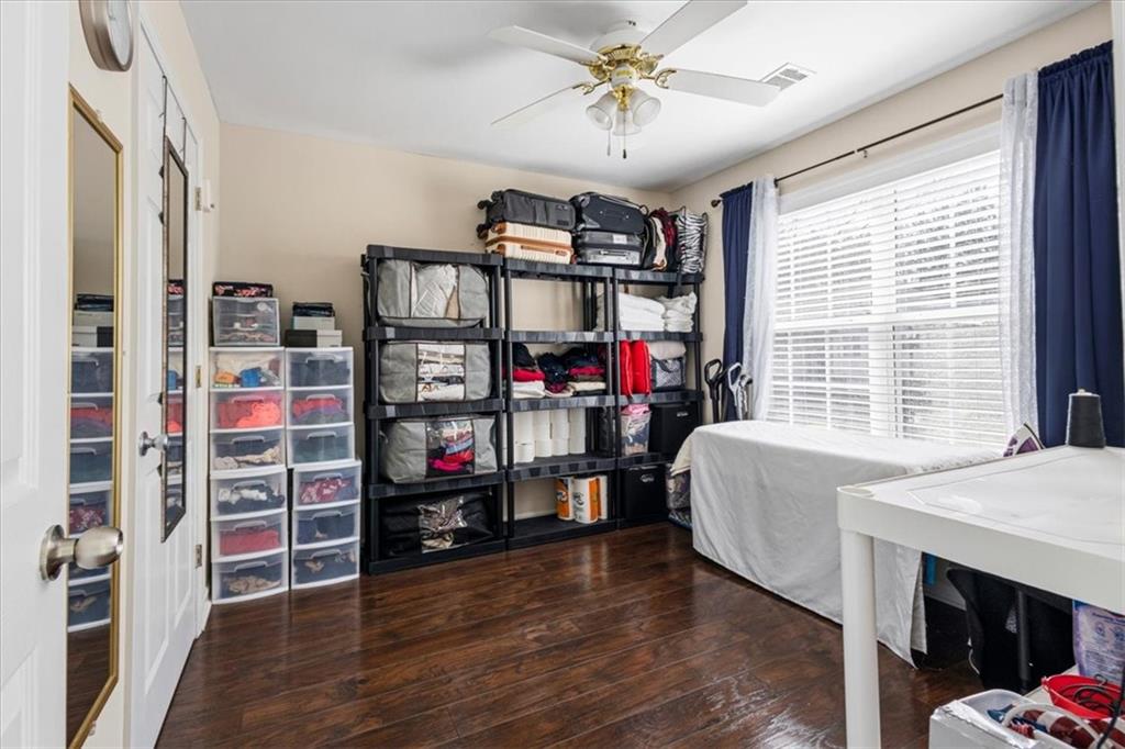 1380 Commonwealth Lane Grayson, GA 30017 - Photo 25 of 46 a living room with hard wood floors and a window