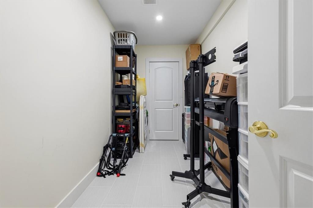 1380 Commonwealth Lane Grayson, GA 30017 - Photo 37 of 46 a view of a room with gym equipment