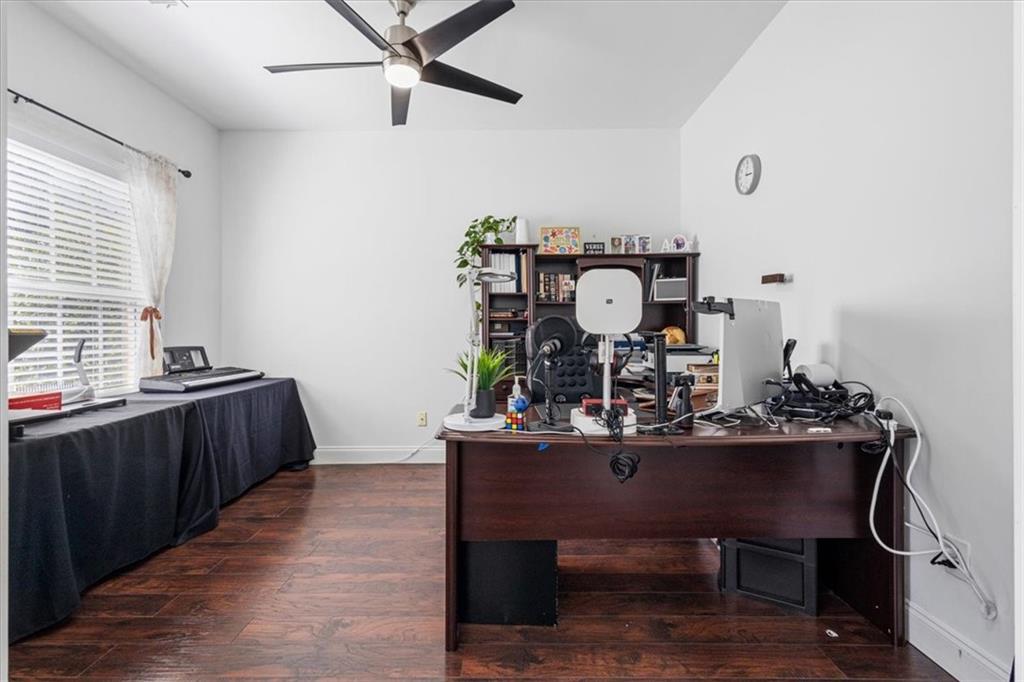 1380 Commonwealth Lane Grayson, GA 30017 - Photo 10 of 46 a view of a workspace with furniture