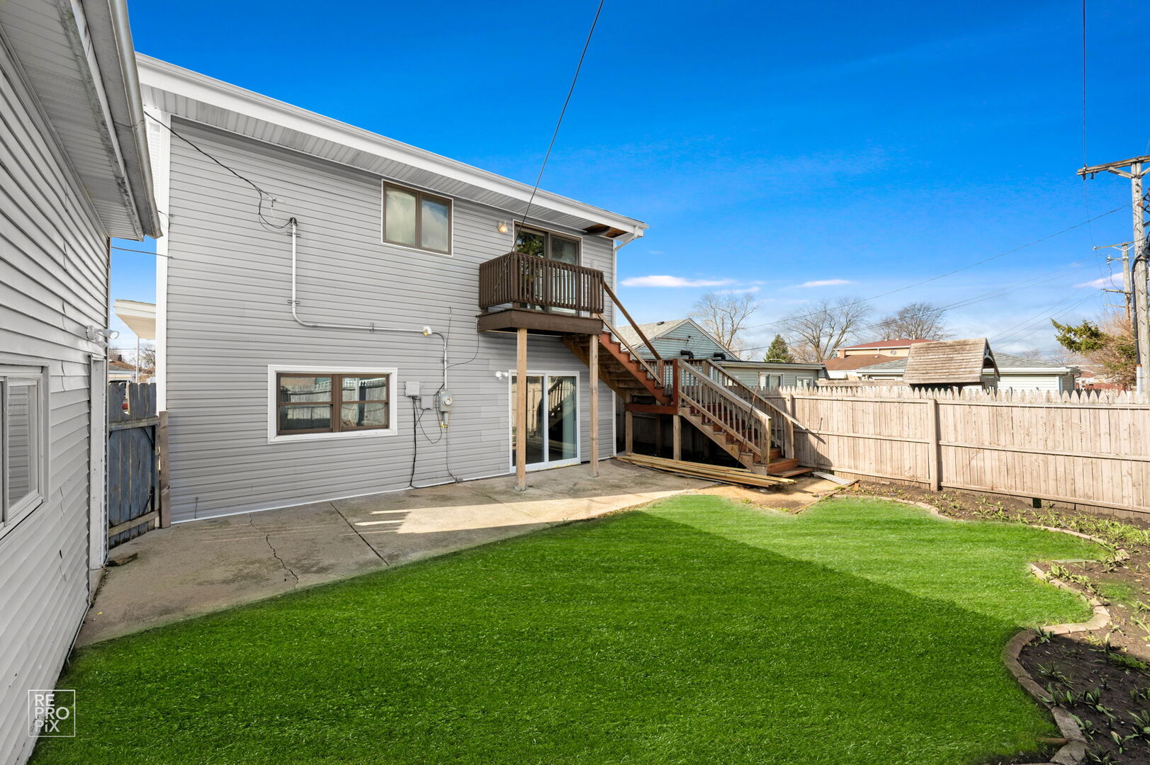 4680 West 83rd Street Chicago, IL 60652 - Photo 17 of 22 a view of a house with a yard and pathway
