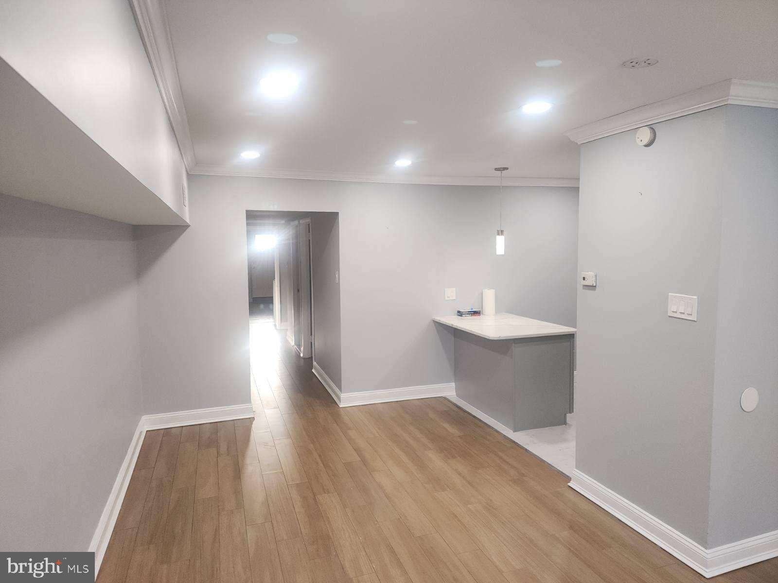 2218 Strahle Street Philadelphia, PA 19152 - Photo 13 of 22 a view of a big room with wooden floor and windows