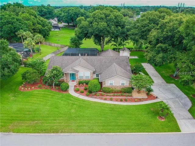 a aerial view of a house with a garden