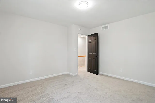 an empty room with an entryway
