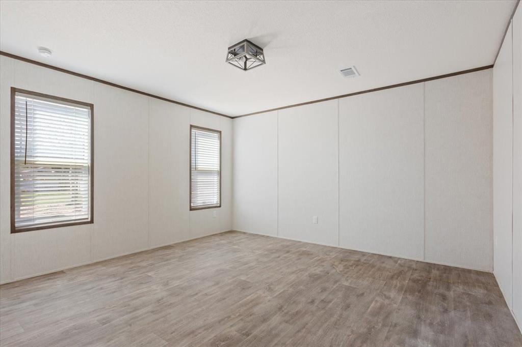 201 North Carpenter Street Mart, TX 76664 - Photo 17 of 30 a view of an empty room with a window