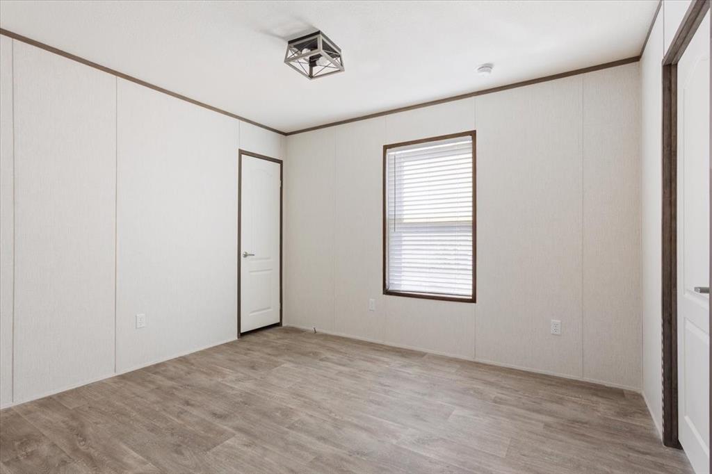 201 North Carpenter Street Mart, TX 76664 - Photo 18 of 30 an empty room with windows