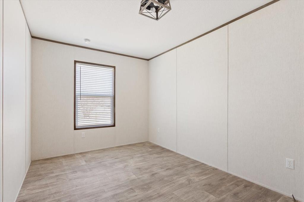 201 North Carpenter Street Mart, TX 76664 - Photo 19 of 30 an empty room with windows