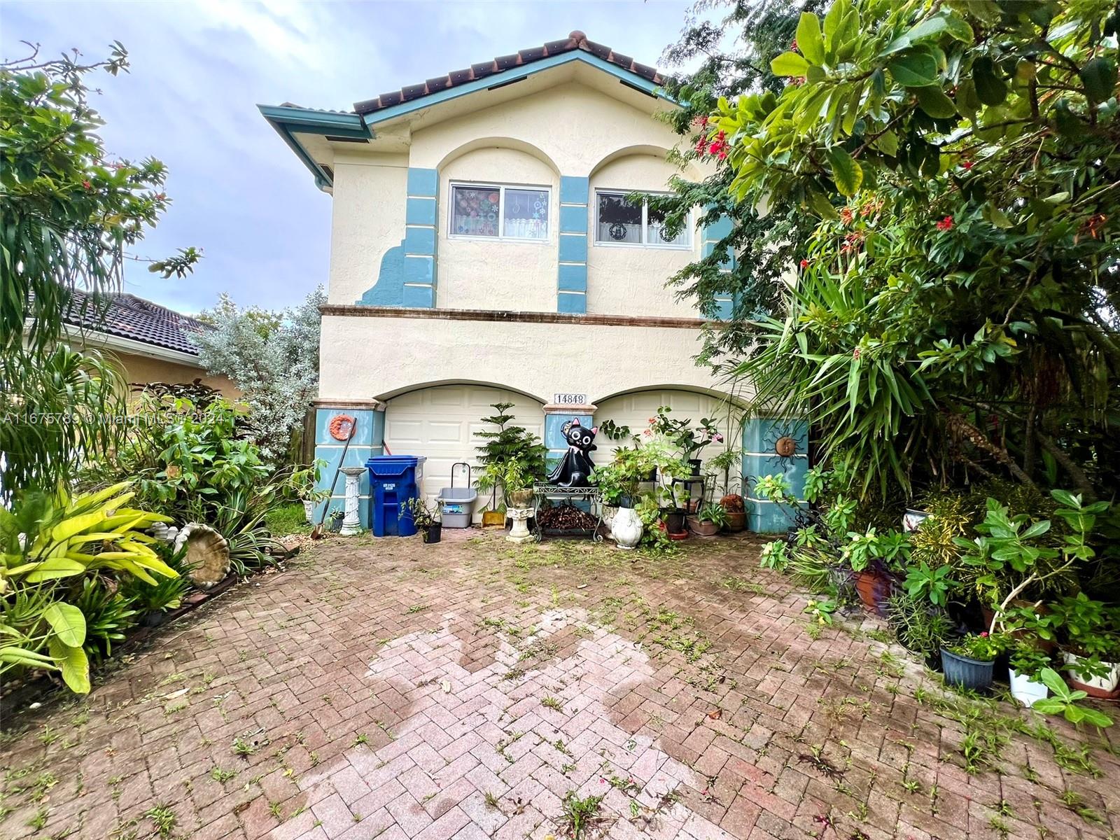14848 Southwest 180th Street Miami, FL 33187 - Photo 1 of 40