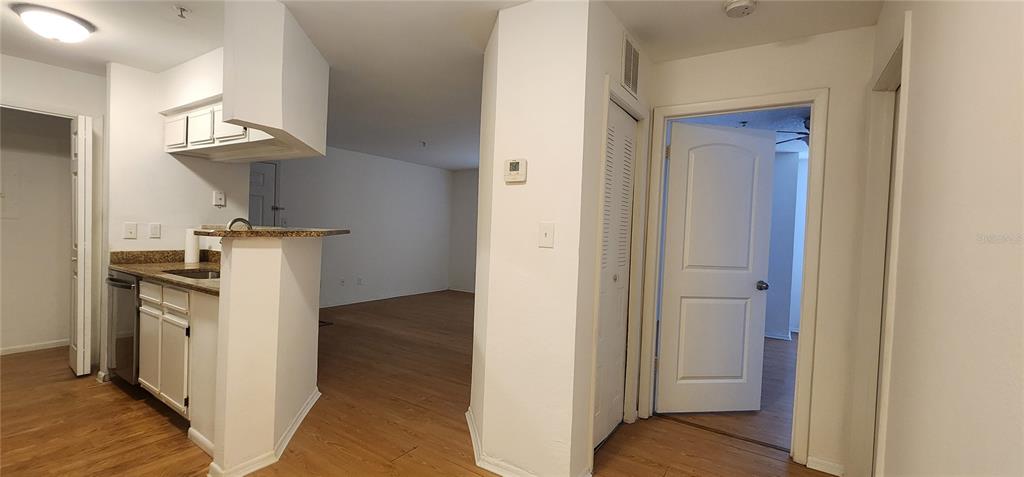 232 Afton Square, Unit 108 Altamonte Springs, FL 32714 - Photo 18 of 26 a view of a kitchen with a sink and a refrigerator