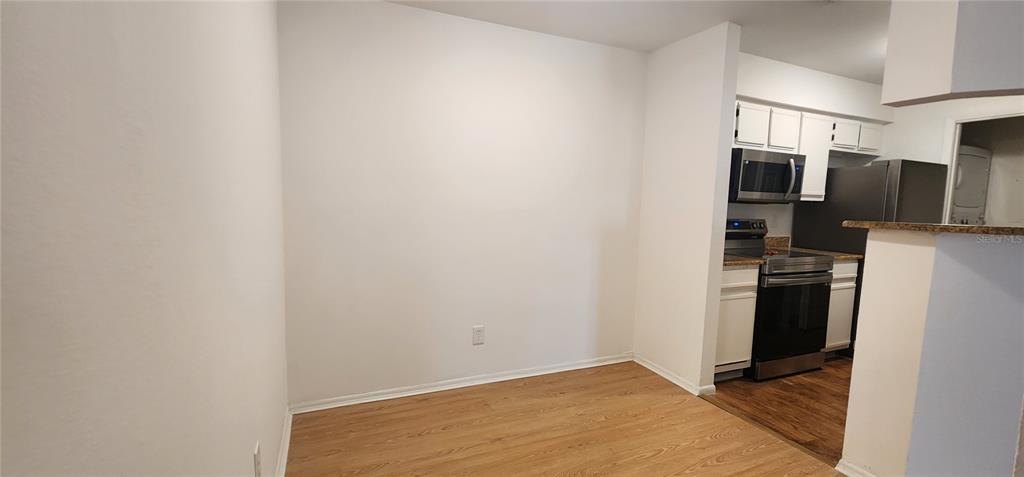 232 Afton Square, Unit 108 Altamonte Springs, FL 32714 - Photo 21 of 26 a view of a kitchen with a sink