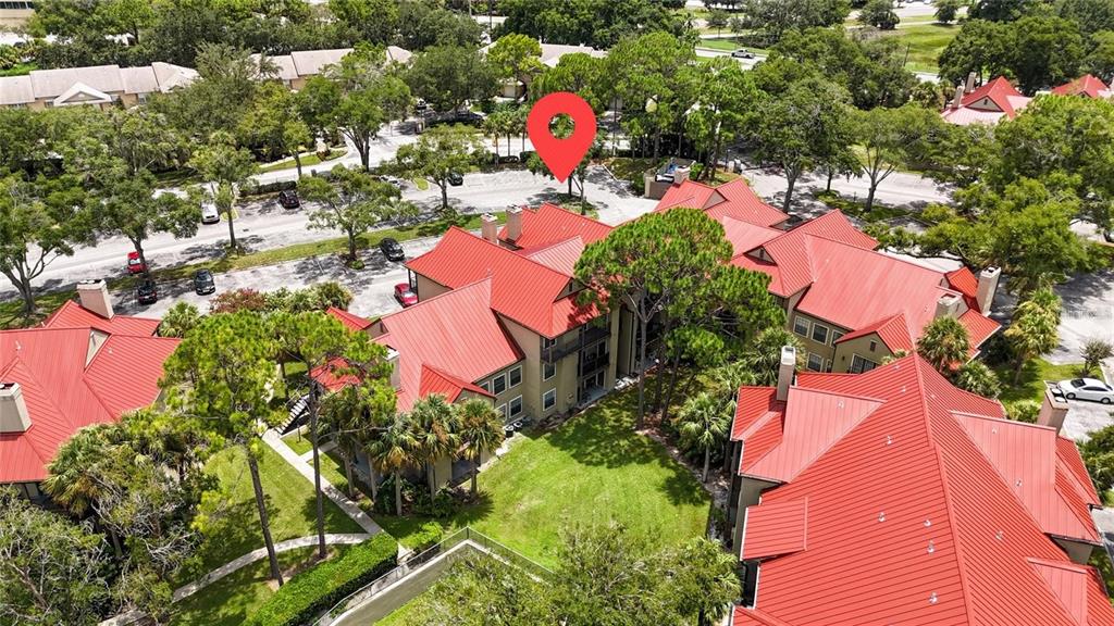 232 Afton Square, Unit 108 Altamonte Springs, FL 32714 - Photo 3 of 26 an aerial view of a house with swimming pool and outdoor seating