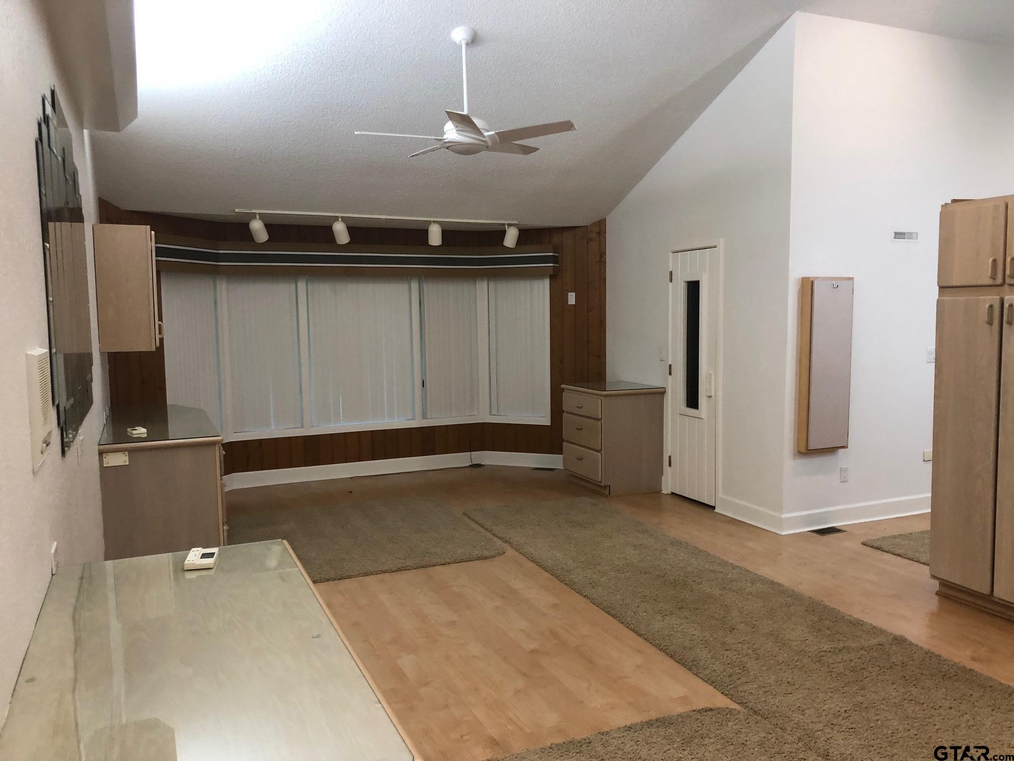 13745 Meadow Lane Flint, TX 75762 - Photo 20 of 38 a view of a livingroom with a staircase
