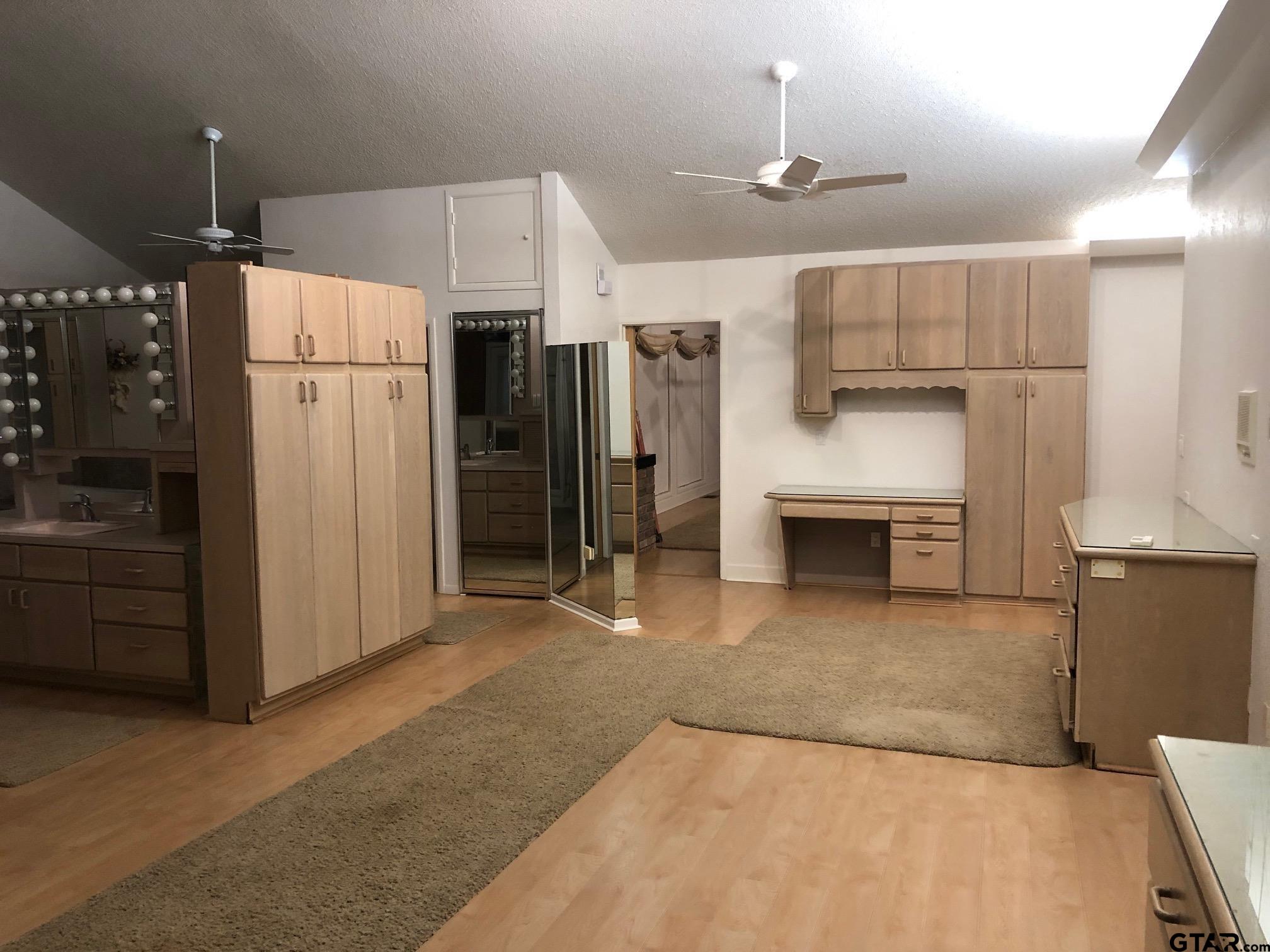 13745 Meadow Lane Flint, TX 75762 - Photo 26 of 38 a view of kitchen and refrigerator cabinets