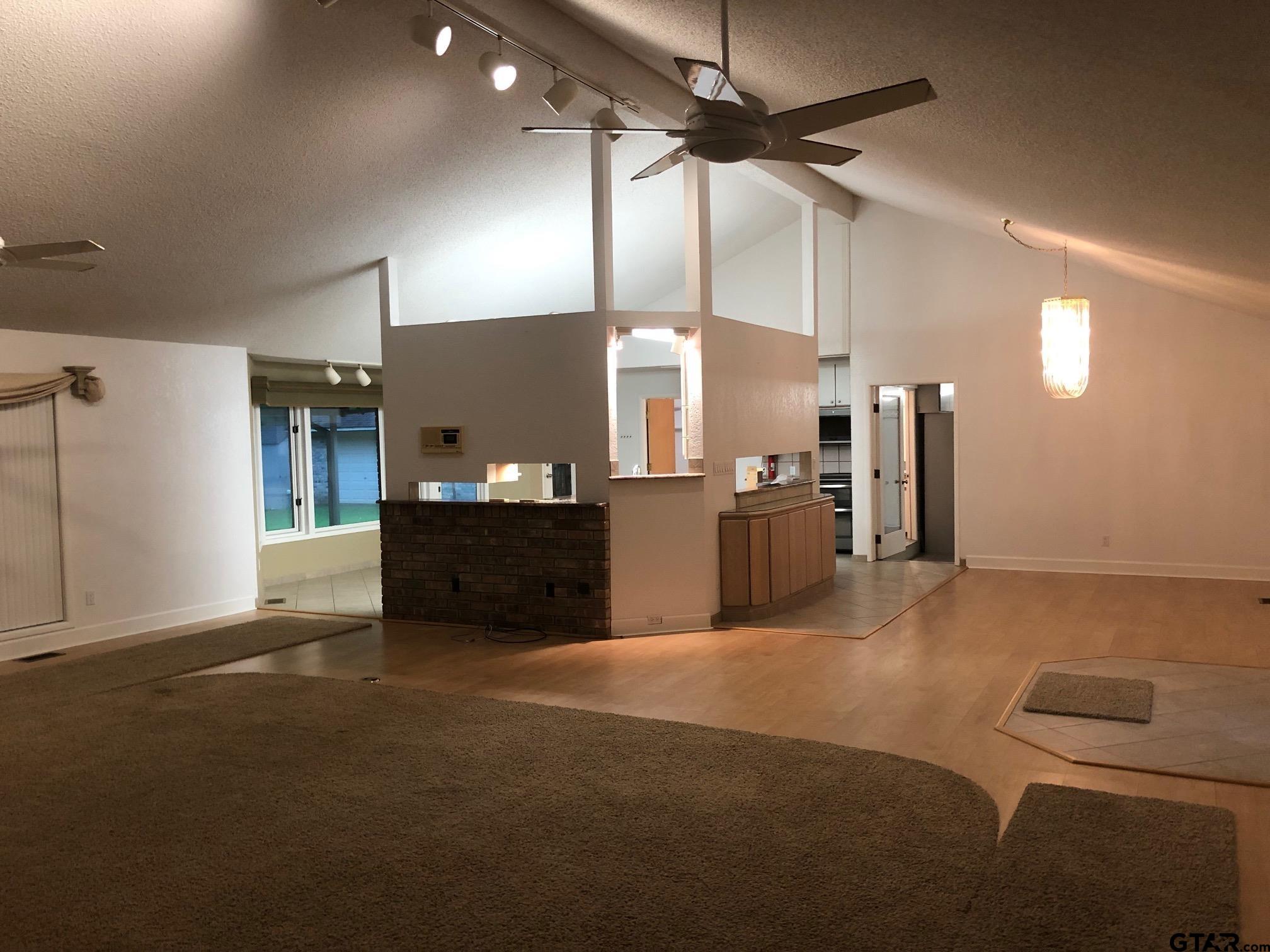13745 Meadow Lane Flint, TX 75762 - Photo 9 of 38 a view of a kitchen with a sink and a refrigerator