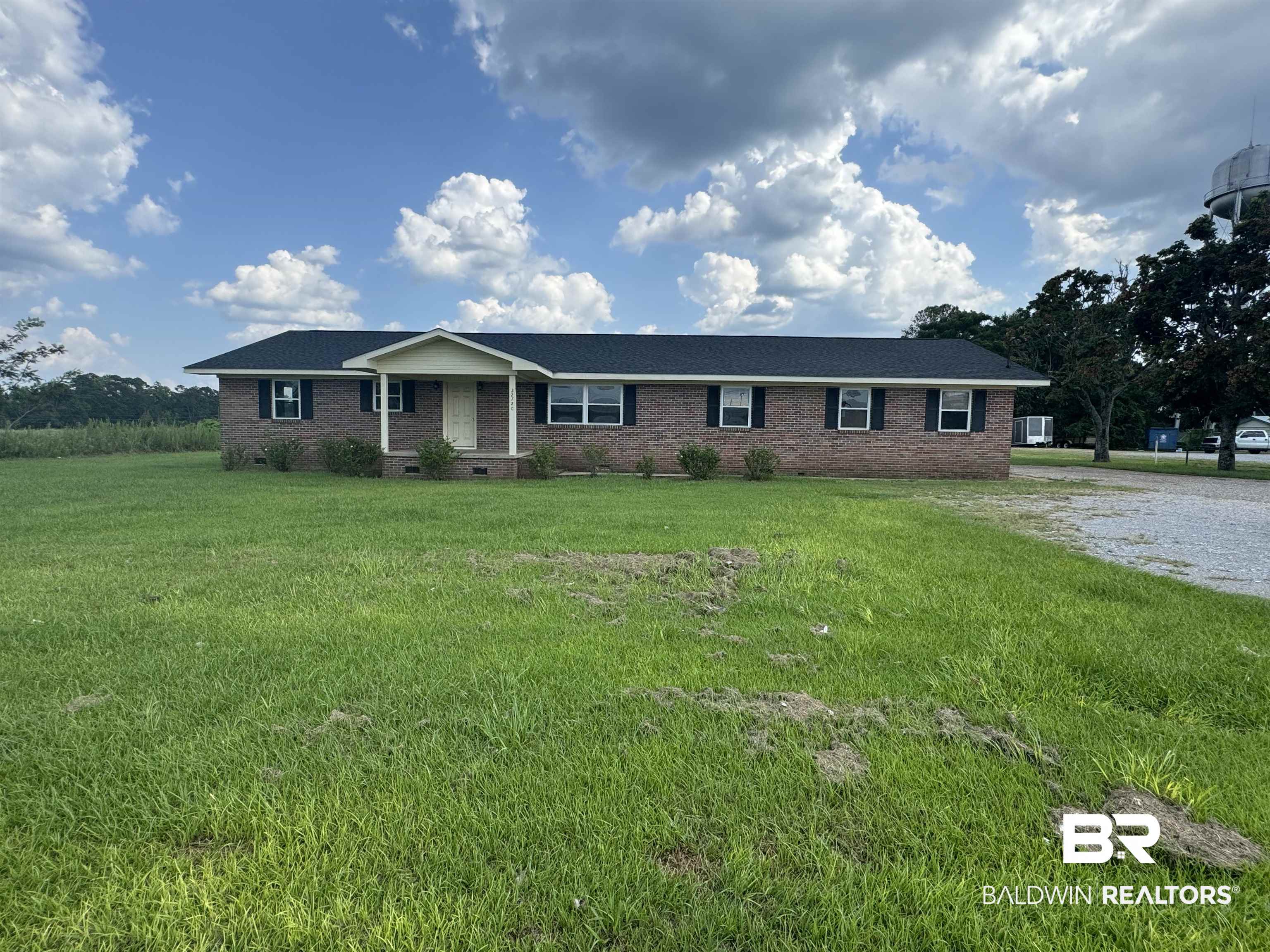 22720 Highway 31 Flomaton, AL 36441 - Photo 1 of 22 Ranch-style house with a front lawn
