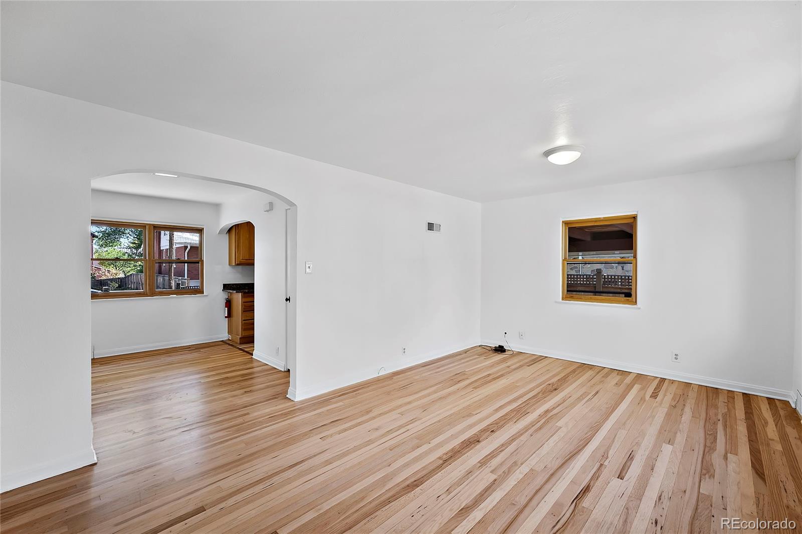 874 9th Street Boulder, CO 80302 - Photo 6 of 23 a view of empty room with wooden floor