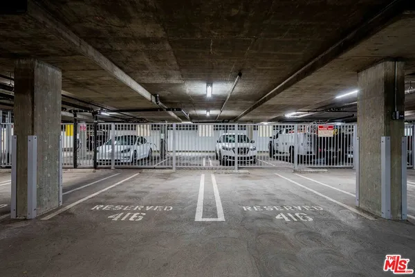 a view of building with an outdoor space and lakeside