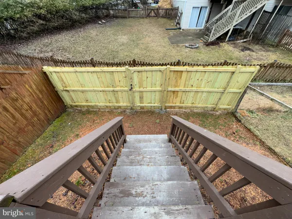 a view of balcony with wooden floor