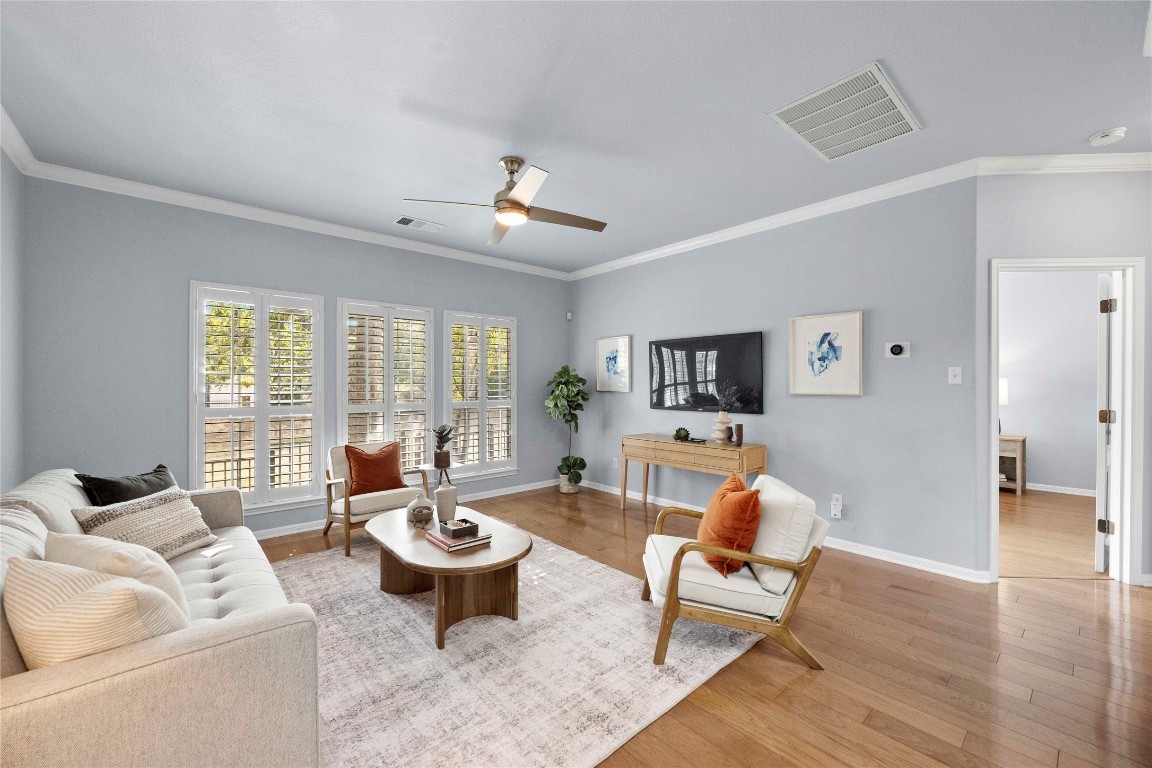 6704 Menchaca Road, Unit 29 Austin, TX 78745 - Photo 2 of 34 a living room with furniture and a large window