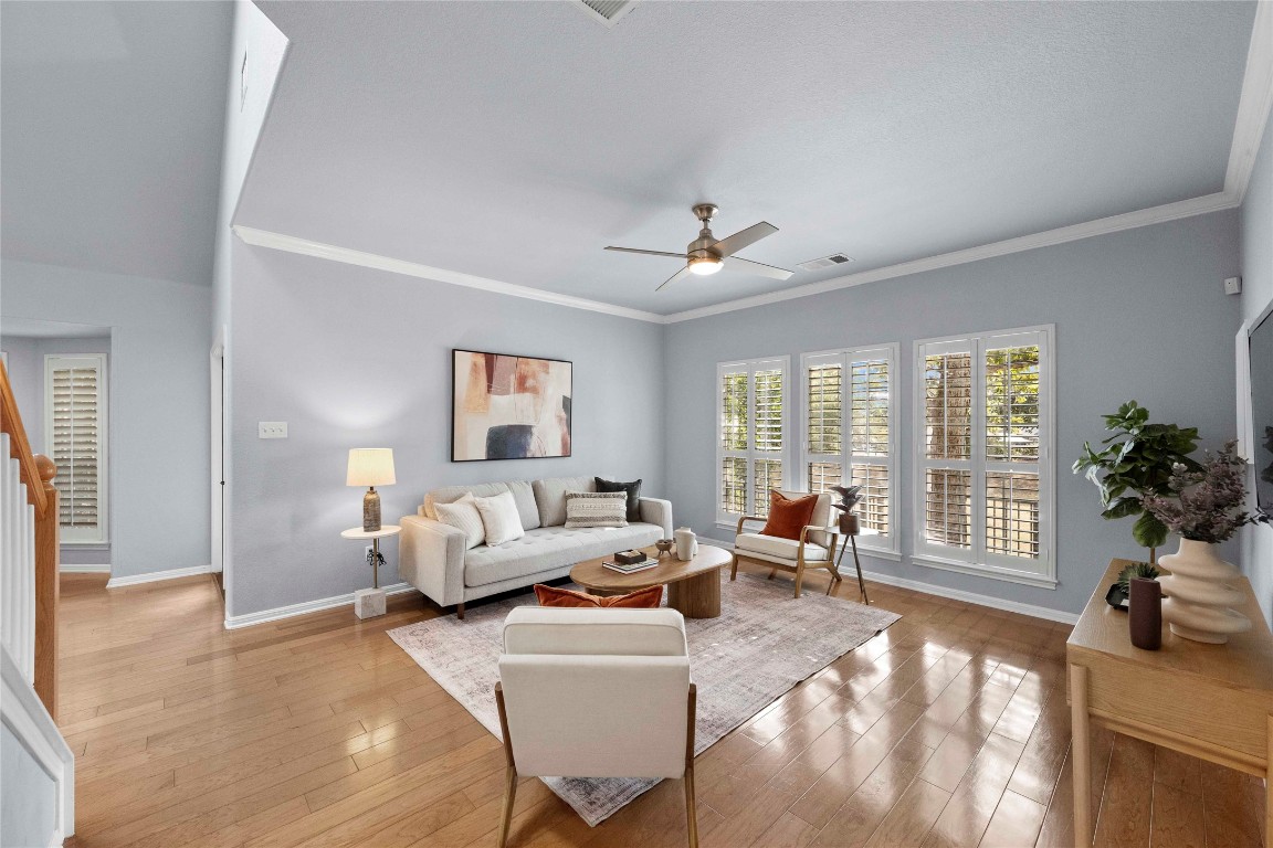 6704 Menchaca Road, Unit 29 Austin, TX 78745 - Photo 3 of 34 a living room with furniture and large windows