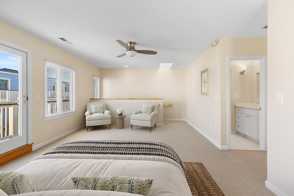 676 Huron Avenue, Unit 43 Cambridge, MA 02138 - Photo 14 of 20 a bedroom with a bed and a window