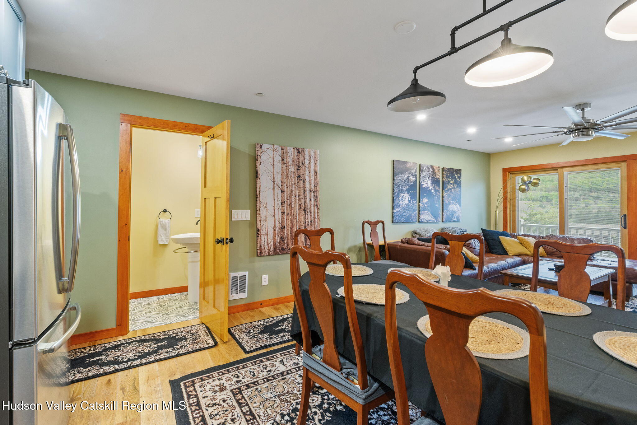 35 Scribner Hollow Road, Unit E3 Hunter, NY 12442 - Photo 11 of 59 a living room with lots of furniture and a large window