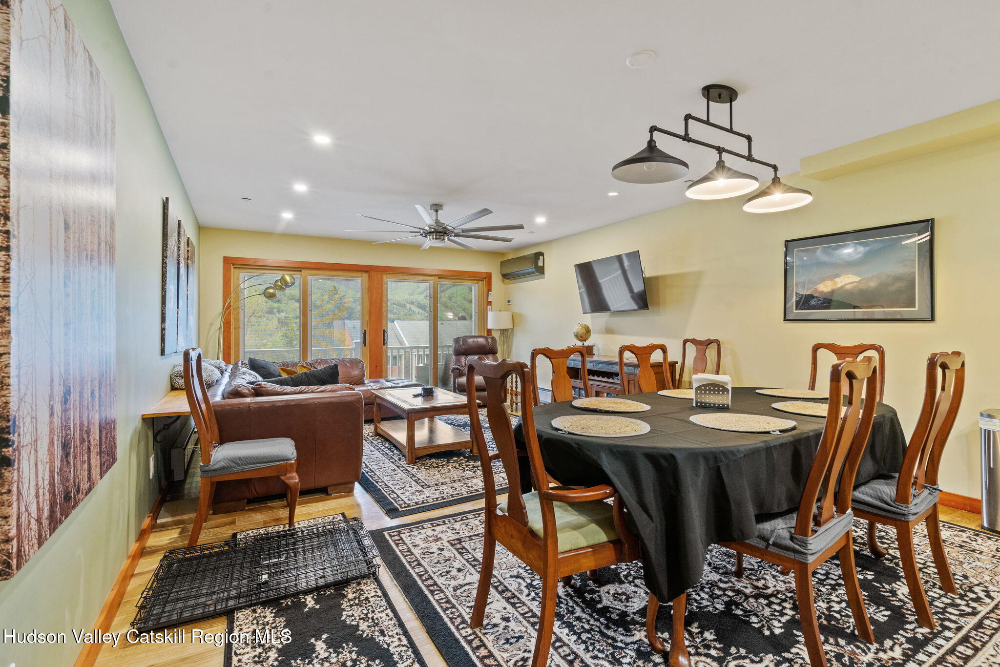 35 Scribner Hollow Road, Unit E3 Hunter, NY 12442 - Photo 12 of 59 a view of a dining room with furniture window and outside view