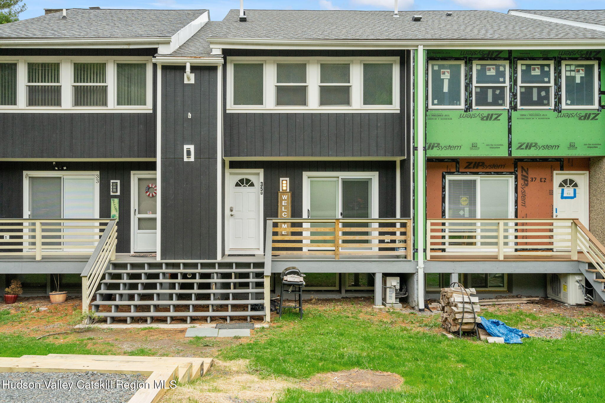 35 Scribner Hollow Road, Unit E3 Hunter, NY 12442 - Photo 2 of 59 a front view of a house with a yard