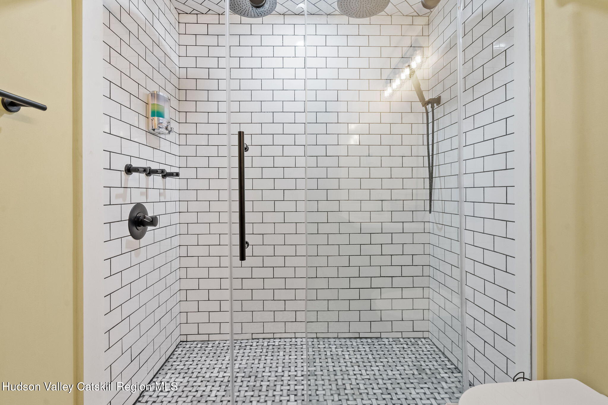 35 Scribner Hollow Road, Unit E3 Hunter, NY 12442 - Photo 29 of 59 a bathroom with a shower