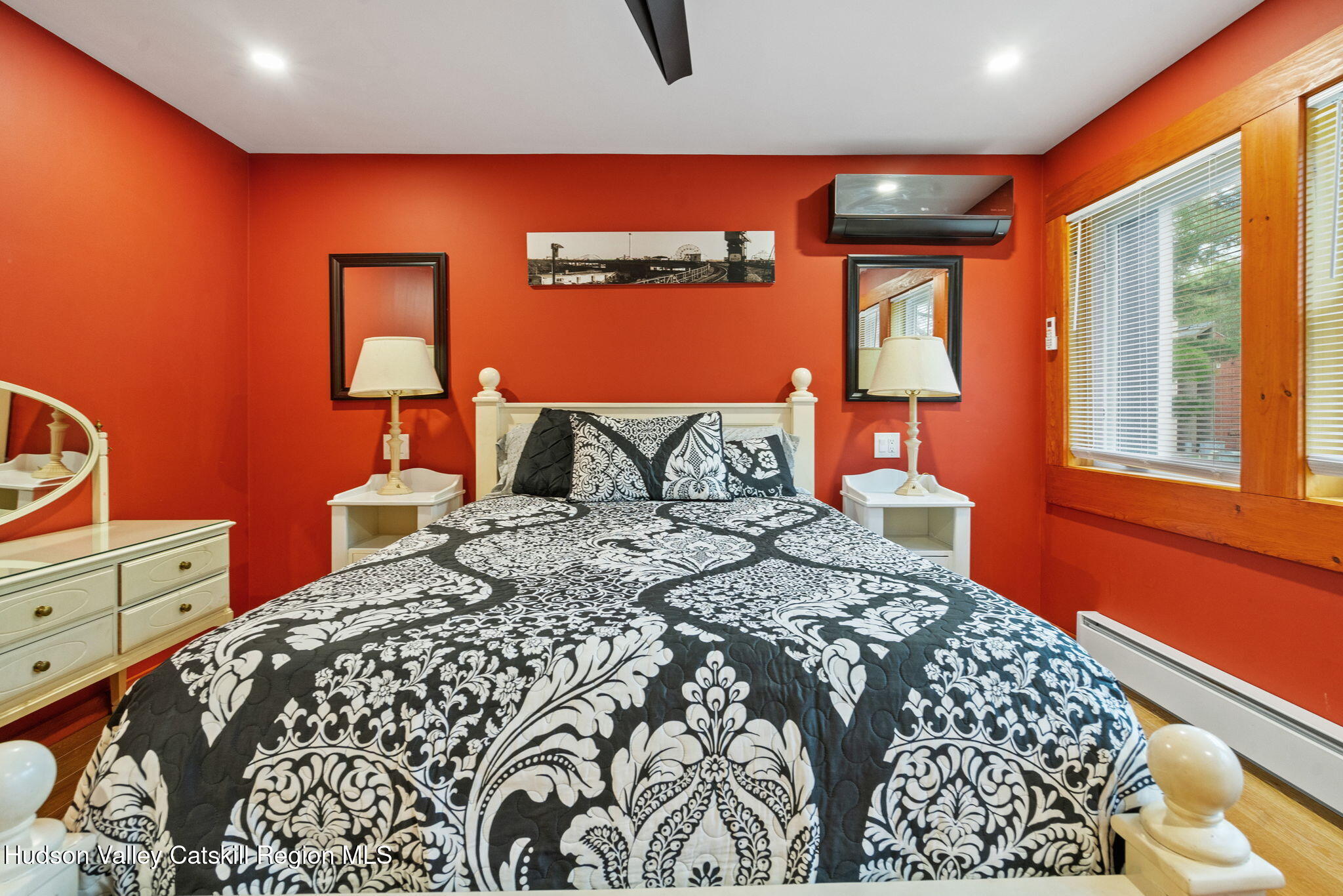 35 Scribner Hollow Road, Unit E3 Hunter, NY 12442 - Photo 34 of 59 a bedroom with a bed and window